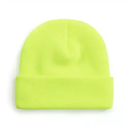 Neon green knit beanie hat on white background.