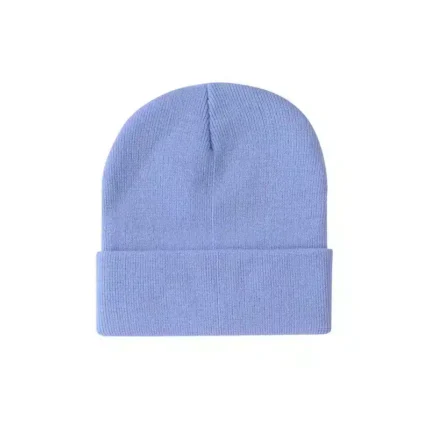 Baby blue knit beanie with ribbed texture and folded cuff.