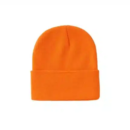 Bright orange knitted beanie hat on white background.