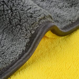 Plush gray and yellow dual-texture blanket with neat dark gray binding.